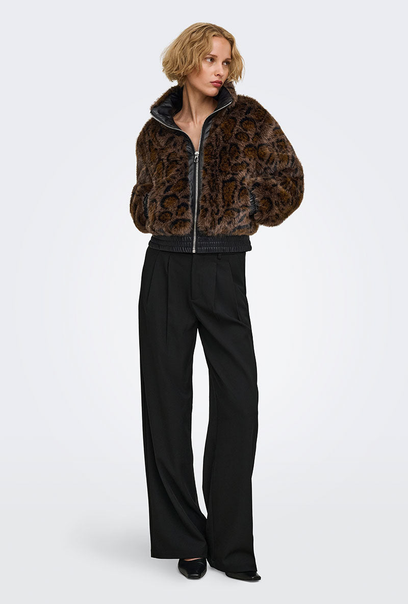 Front image of a model wearing Rikke faux fur jacket in black, by brand Only
