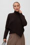 Front image of a model wearing Camila ls cape higneck pullover in chocolate, by brand Vero moda