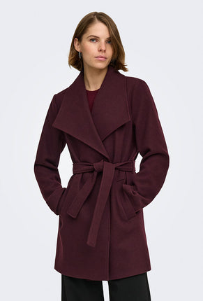Front image of a model wearing Trish wrap coat in chocolate, by brand Only