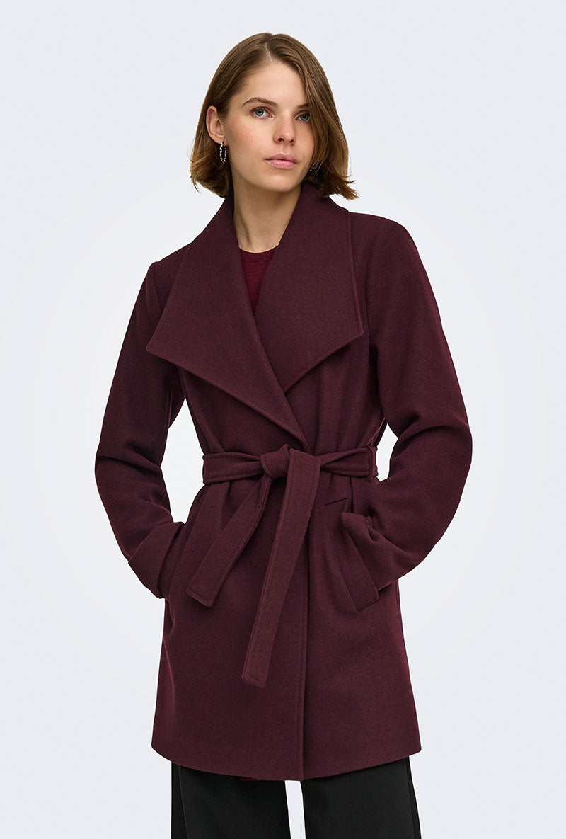 Front image of a model wearing Trish wrap coat in chocolate, by brand Only