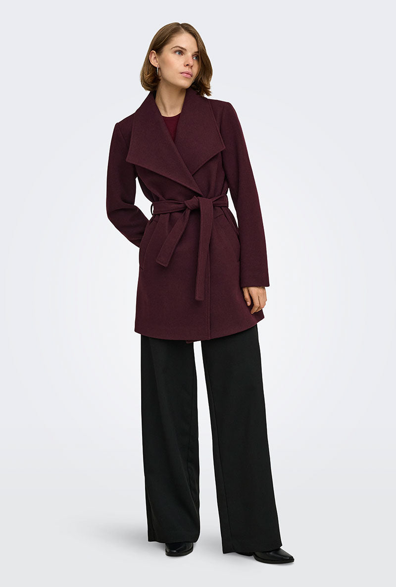 Front image of a model wearing Trish wrap coat in chocolate, by brand Only