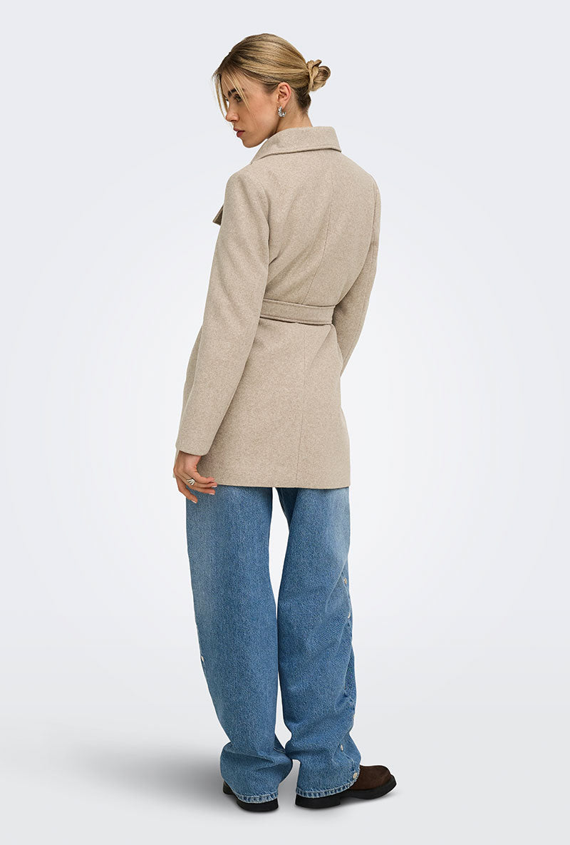 Back image of a model wearing Trish wrap coat in light brown, by brand Only