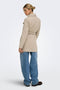 Back image of a model wearing the Trish wrap coat in light brown, by brand Only