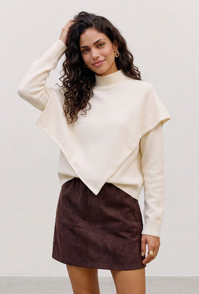 Front image of a model wearing Camila ls cape higneck pullover in cream, by brand Vero moda