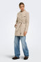 Front image of a model wearing the Trish wrap coat in light brown, by brand Only