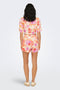 Back image of a model wearing the Only zuffy life shorts in orange, by brand Only