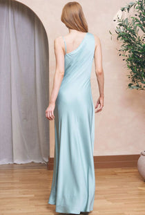 Back image of a model wearing the Sammy satin  maxi dress in aqua, by brand Tfnc