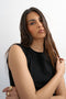Front image of a model wearing the Adela sl rib boyfriend tank top in black, by brand Top shop