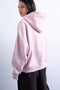 Back image of a model wearing the Bibi ls ultimate hoodie in pink, by brand Top shop