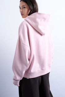 Back image of a model wearing the Bibi ls ultimate hoodie in pink, by brand Top shop