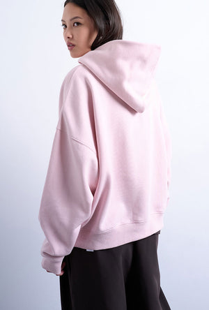 Back image of a model wearing the Bibi ls ultimate hoodie in pink, by brand Top shop