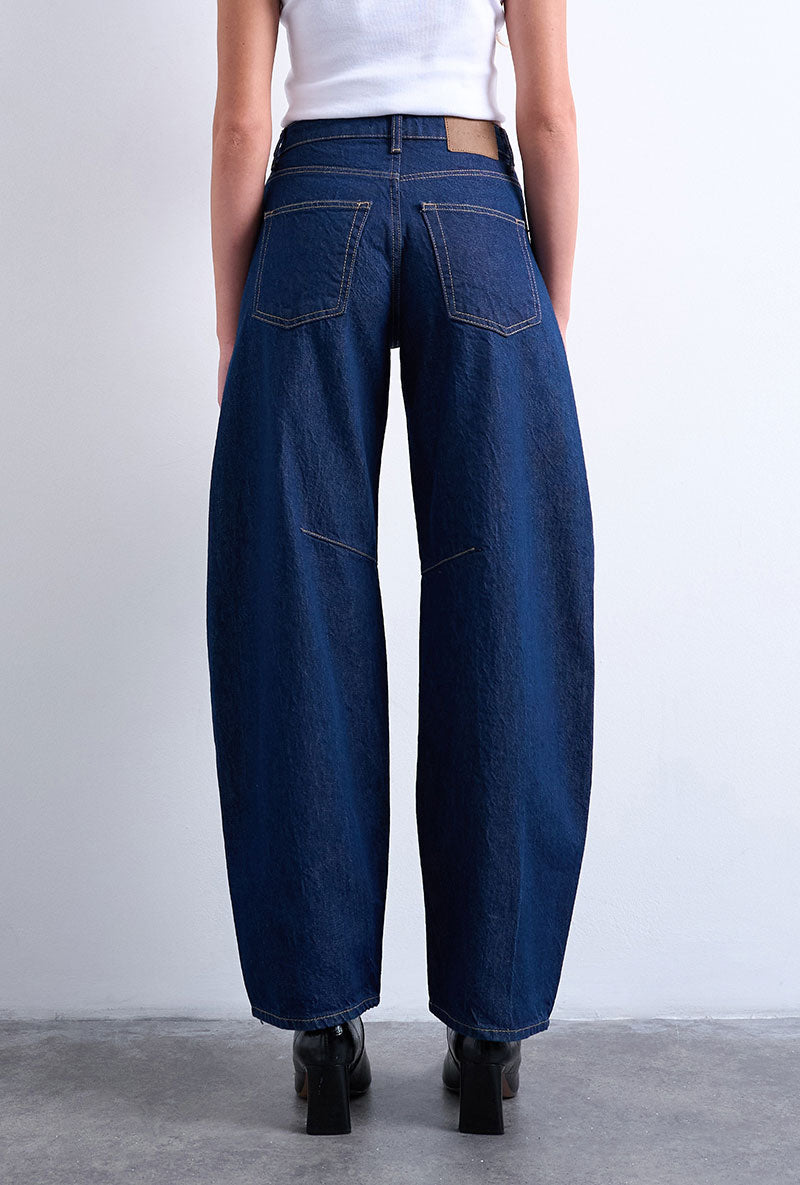 Back image of a model wearing Barrel hr denim jeans in dark denim, by brand Top shop