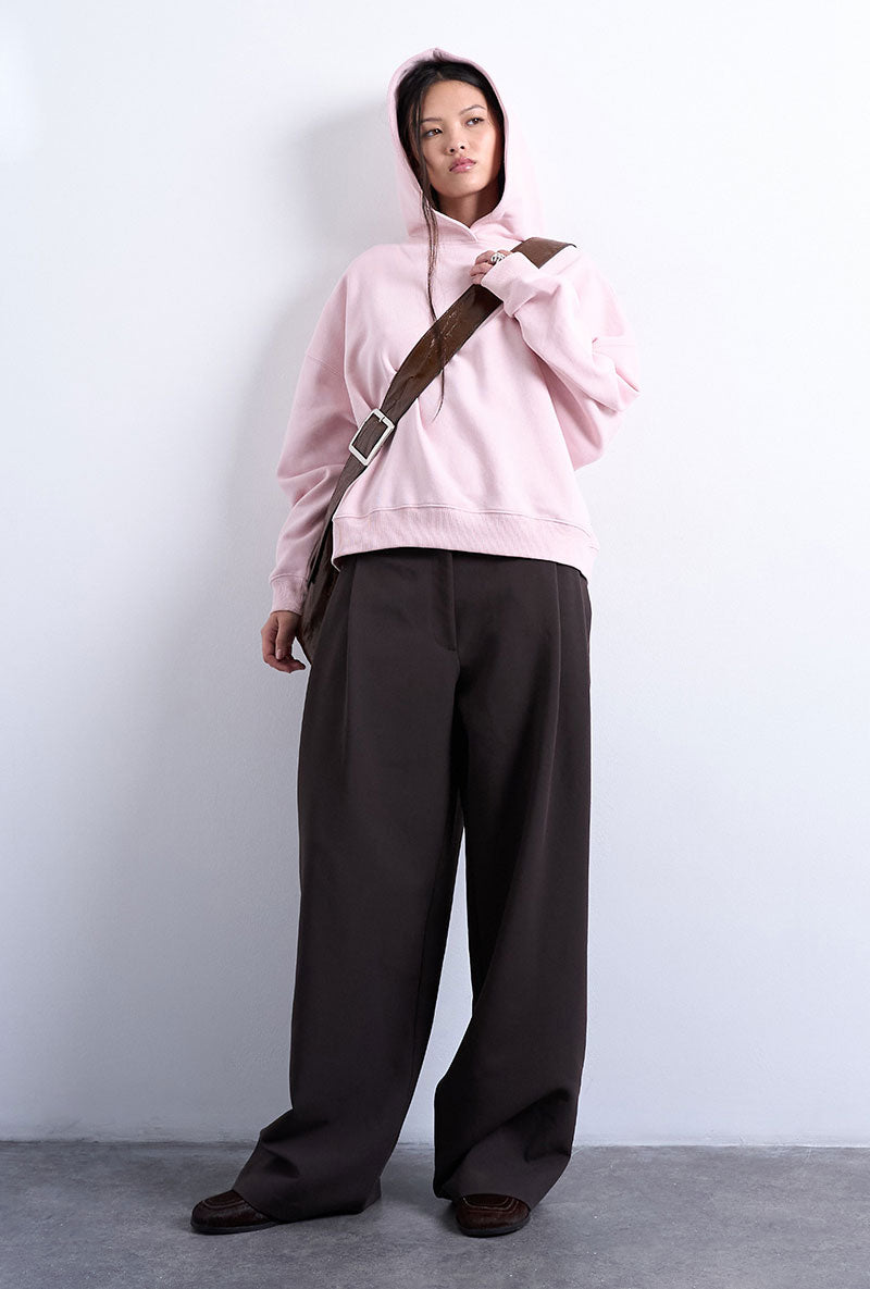Front image of a model wearing Bibi ls ultimate hoodie in pink, by brand Top shop