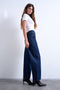 Front image of a model wearing the Barrel hr denim jeans in dark denim, by brand Top shop