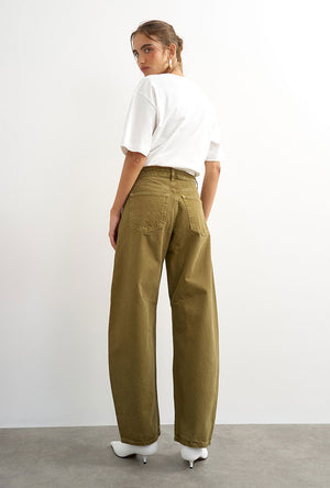Back image of a model wearing the Barrel khaki jeans in khaki, by brand Top shop