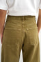 Back image of a model wearing the Barrel khaki jeans in khaki, by brand Top shop