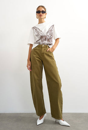 Front image of a model wearing Barrel khaki jeans in khaki, by brand Top shop