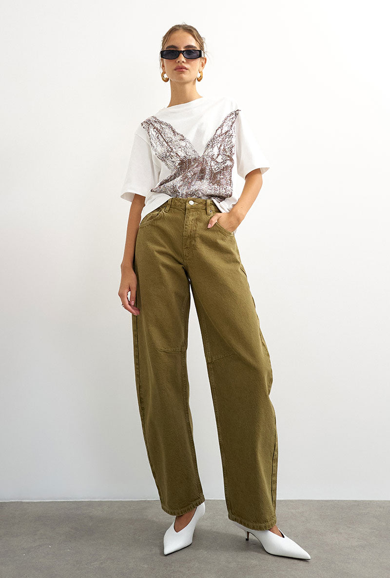 Front image of a model wearing Barrel khaki jeans in khaki, by brand Top shop