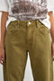 Front image of a model wearing the Barrel khaki jeans in khaki, by brand Top shop