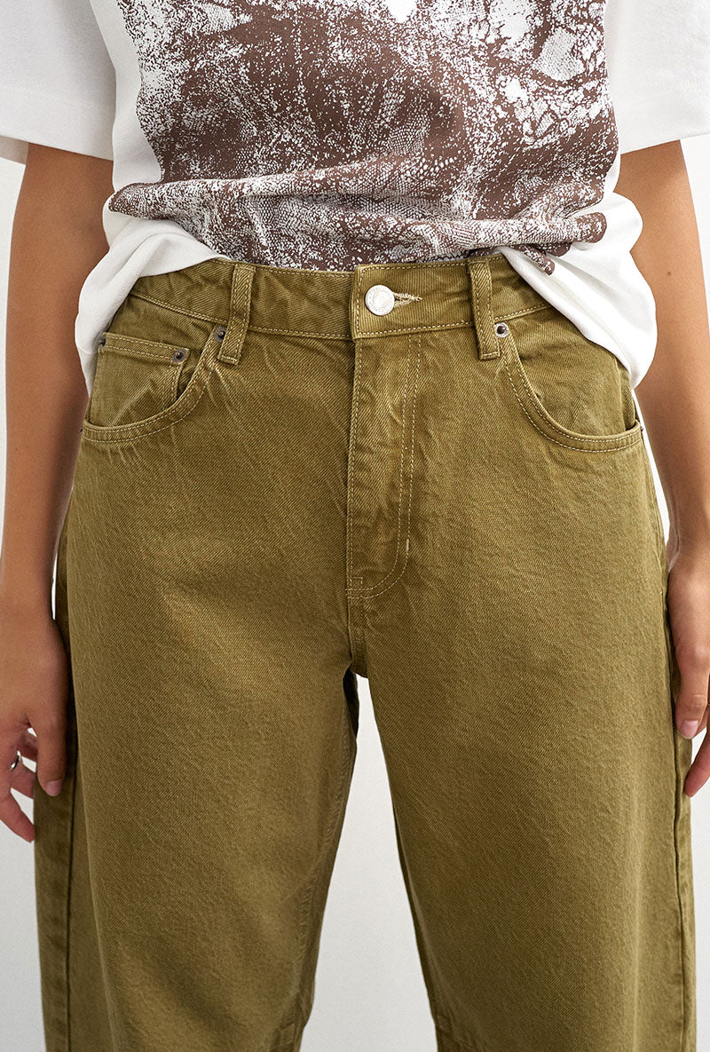 Front image of a model wearing Barrel khaki jeans in khaki, by brand Top shop