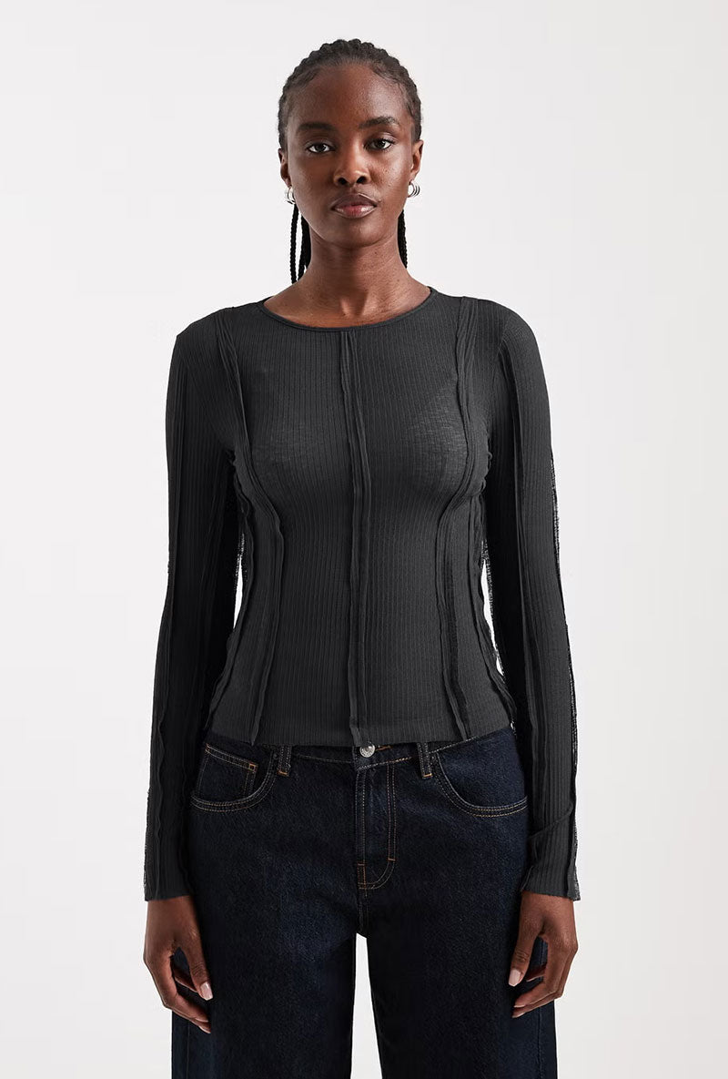 Front image of a model wearing Belma l/s oneck sheer top in black, by brand Top shop
