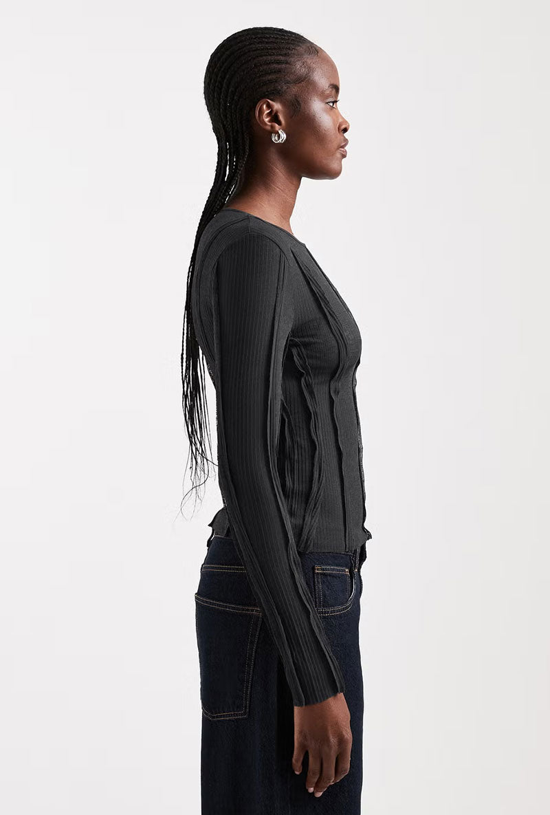 Front image of a model wearing Belma l/s oneck sheer top in black, by brand Top shop