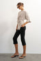 Front image of a model wearing the Betja ss wrap tshirt in beige, by brand Top shop
