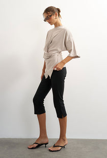 Front image of a model wearing the Betja ss wrap tshirt in beige, by brand Top shop