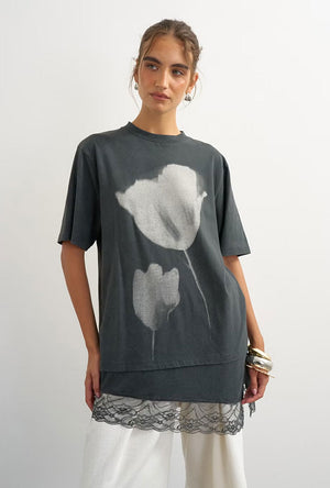 Front image of a model wearing the Brit ss lace floral tee in black, by brand Top shop