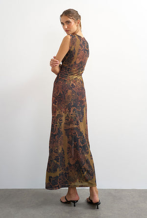 Back image of a model wearing the Caisa mesh check maxi dress in brown, by brand Top shop