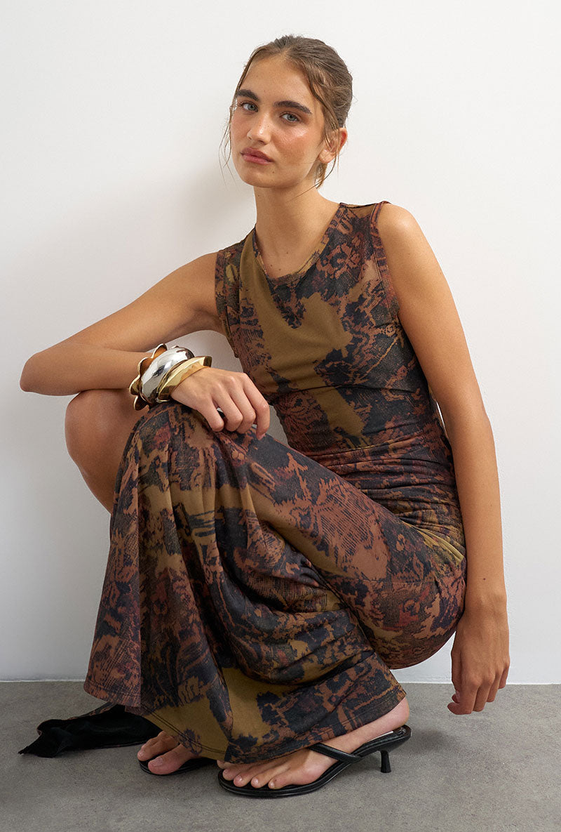 Front image of a model wearing Caisa mesh check maxi dress in brown, by brand Top shop