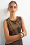 Front image of a model wearing the Caisa mesh check maxi dress in brown, by brand Top shop