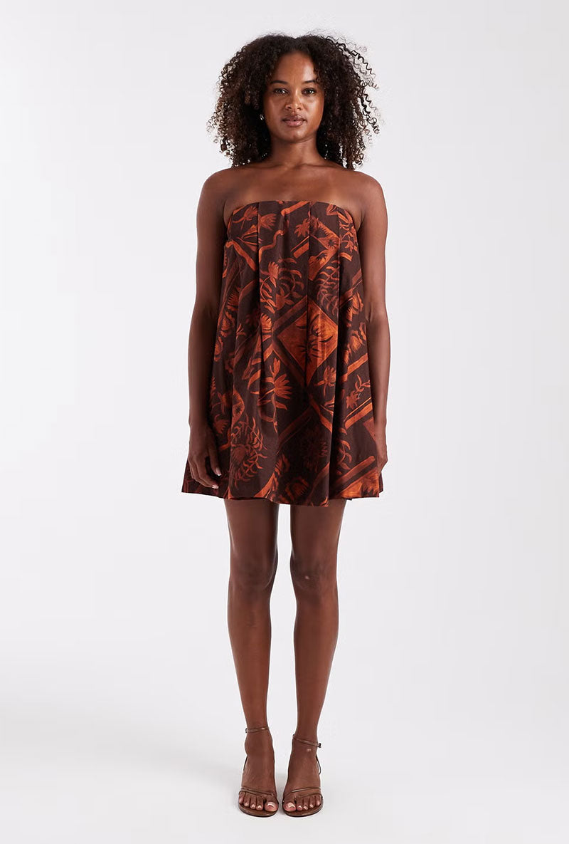 Front image of a model wearing Calla bandeau mini dress in rust, by brand Top shop