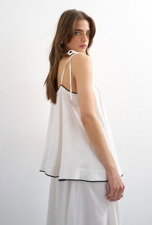 Back image of a model wearing the Caro cami top in off white, by brand Top shop