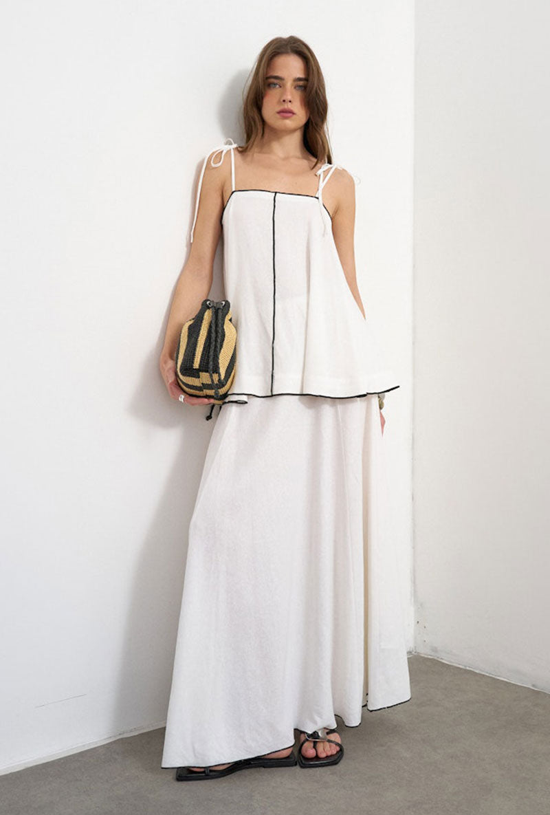 Front image of a model wearing Caro cami top in off white, by brand Top shop