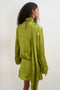 Back image of a model wearing the Ceren satin scarf tie mini dress in green, by brand Top shop