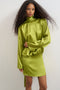 Front image of a model wearing the Ceren satin scarf tie mini dress in green, by brand Top shop