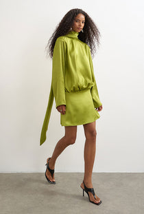 Front image of a model wearing the Ceren satin scarf tie mini dress in green, by brand Top shop