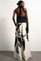 Back image of a model wearing the Fiona wide leg trousers in off white, by brand Top shop
