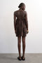 Back image of a model wearing the Mia trapeze mini dress in chocolate, by brand Top shop