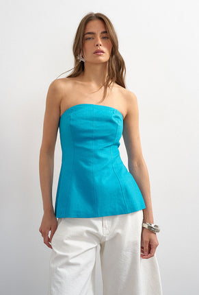 Front image of a model wearing Rosa tailored bandeau in blue, by brand Top shop