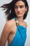 Front image of a model wearing the Nana beaded neck maxi dress in blue, by brand Top shop