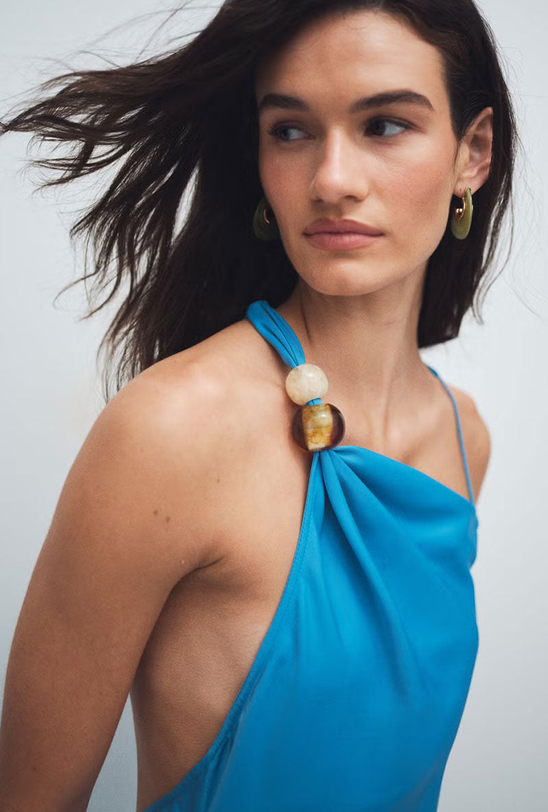 Front image of a model wearing Nana beaded neck maxi dress in blue, by brand Top shop