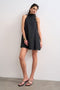 Front image of a model wearing the Sara sl trapeze mini dress in black, by brand Top shop