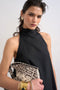 Front image of a model wearing the Sara sl trapeze mini dress in black, by brand Top shop