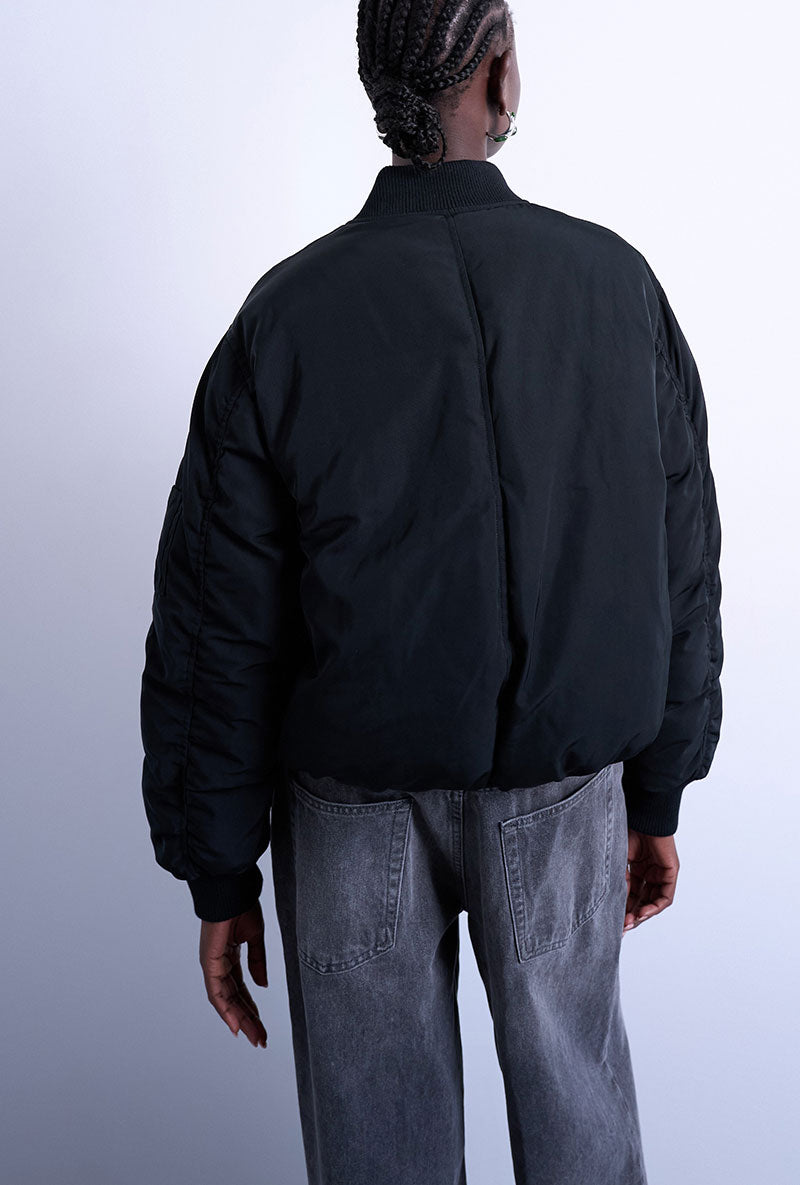 Back image of a model wearing Vera bomber in black, by brand Top shop