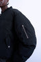 Front image of a model wearing the Vera bomber in black, by brand Top shop