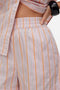 Front image of a model wearing the Glow hw shorts in pink, by brand Vero moda
