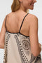 Back image of a model wearing the Lalita zola ankle dress in beige, by brand Vero moda