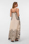 Back image of a model wearing the Lalita zola ankle dress in beige, by brand Vero moda